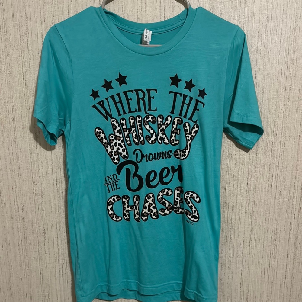 Where the whiskey drowns and the beer chases women’s shirt